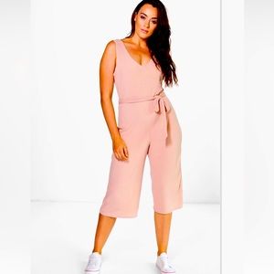 Boohoo Pink sleeveless jumpsuit, with belt.